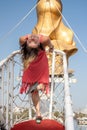 Girl standing on the bow of the ship Royalty Free Stock Photo