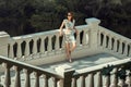 Girl standing on the bridge. Royalty Free Stock Photo
