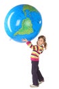 Girl standing and holding big inflatable globe Royalty Free Stock Photo