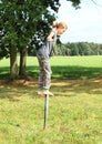 Girl standing on iron pillar