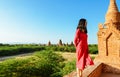 Girl standing on Myanmar pagoda, looking away Royalty Free Stock Photo