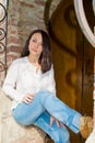 Girl standing at the old wooden door Royalty Free Stock Photo