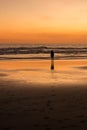 girl standing right next to the ocean in El Salvador Royalty Free Stock Photo