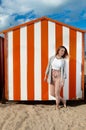 Girl sun sand hut, De Panne, Belgium Royalty Free Stock Photo
