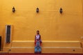 Girl standing on a street wall in Valladolid, Mexico Royalty Free Stock Photo