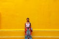 Girl standing on a street wall in Valladolid, Mexico Royalty Free Stock Photo