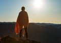 A girl standing at a top of a hill Royalty Free Stock Photo