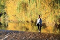 Girl standing on weir Royalty Free Stock Photo