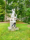 A girl stands at the memory in the forest in spa resort Marianske Lazne Royalty Free Stock Photo