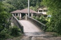 Girl stands on the old bridge Royalty Free Stock Photo