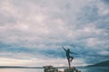 Woman catches balance on the stone