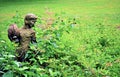 Girl statue in a garden-1