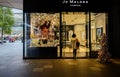 Girl stepping in perfume shop at Taikooli,Chengdu