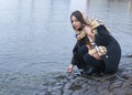 Girl stone bridge at the river