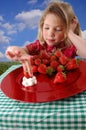 Girl with strawberries Royalty Free Stock Photo