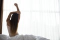 Girl streching in bed Royalty Free Stock Photo