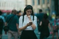 Girl on the street among the crowd of passers-by, photos in the style of surveillance Royalty Free Stock Photo