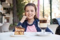 Girl in the street drink a capuccino Royalty Free Stock Photo