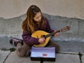Girl - a street musician Royalty Free Stock Photo