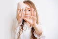 Girl stretching her arms forward, she making framing with her hands Royalty Free Stock Photo