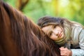 A girl strolls on her horse Royalty Free Stock Photo