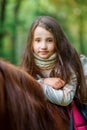 A girl strolls on her horse Royalty Free Stock Photo