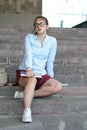 Girl student with books in her hand Royalty Free Stock Photo