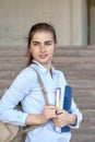 Girl student with books in her hand Royalty Free Stock Photo