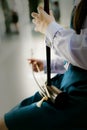 Girl student is playing thai music instrument,treble fiddle,violon soprano Royalty Free Stock Photo