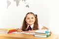 Girl studing at table on white background