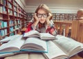 Girl Studying Hard in Library Royalty Free Stock Photo