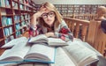 Girl Studying Hard in Library Royalty Free Stock Photo