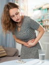 Girl suffering from abdominal pain