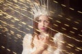 Girl in a suit of the Snow Queen at the Christmas party night Royalty Free Stock Photo