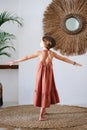 Girl spins in place with her arms outstretched