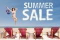 Girl with summer sale cloud at coast Royalty Free Stock Photo