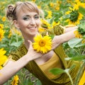 Girl with a sunflowers Royalty Free Stock Photo