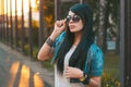 Girl in sunglasses. sun rays sunset Royalty Free Stock Photo