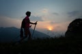 Girl during a sunset evening trek in the hills