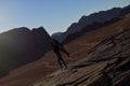 Girl at the sunset in the Wadi Rum desert in Jordan Royalty Free Stock Photo