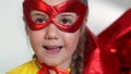 girl superhero portrait face. feminism a happy family a close-up home kid dream concept. child superhero in mask Royalty Free Stock Photo