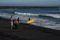 Girl surfer goes to the ocean