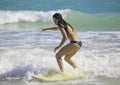 Girl surfing at Kailua Beach