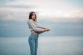 Girl in a sweater near the sea Royalty Free Stock Photo