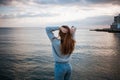 Girl in a sweater near the sea Royalty Free Stock Photo