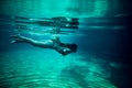 Girl swim underwater pool