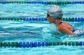 Girl swimming breaststroke Royalty Free Stock Photo