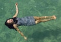 Girl swimming in the ocean Royalty Free Stock Photo