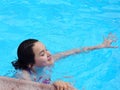 Girl Swimming in Pool