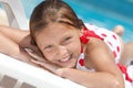 Girl by the swimming pool Royalty Free Stock Photo